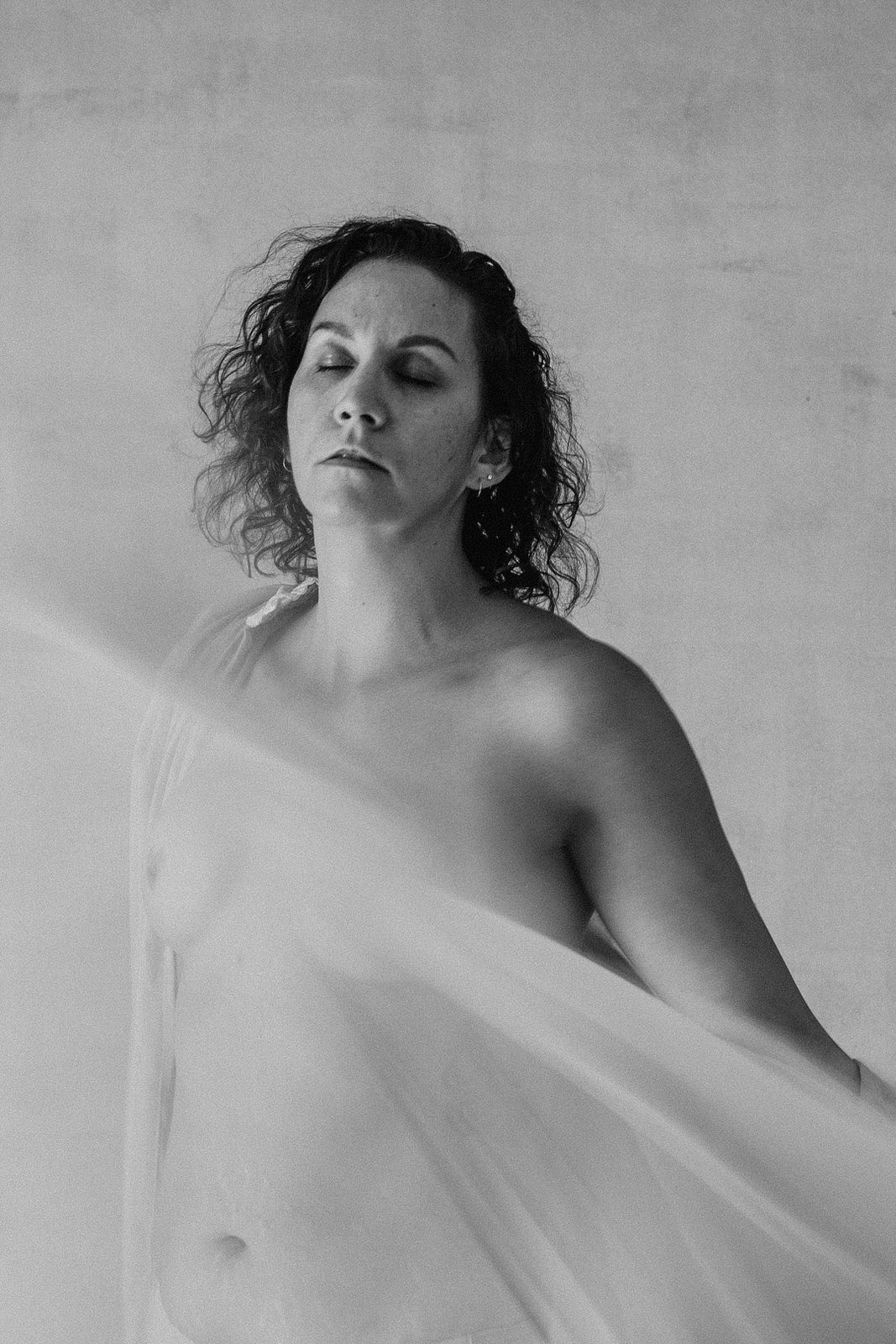 Vancouver boudoir photographer Michele Mateus captures woman with mastectomy cancer scars in empowering black and white intimate portrait session