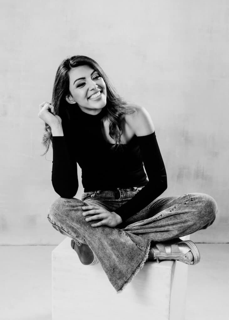 Vancouver boudoir black and white portrait of women sitting on a box laughing