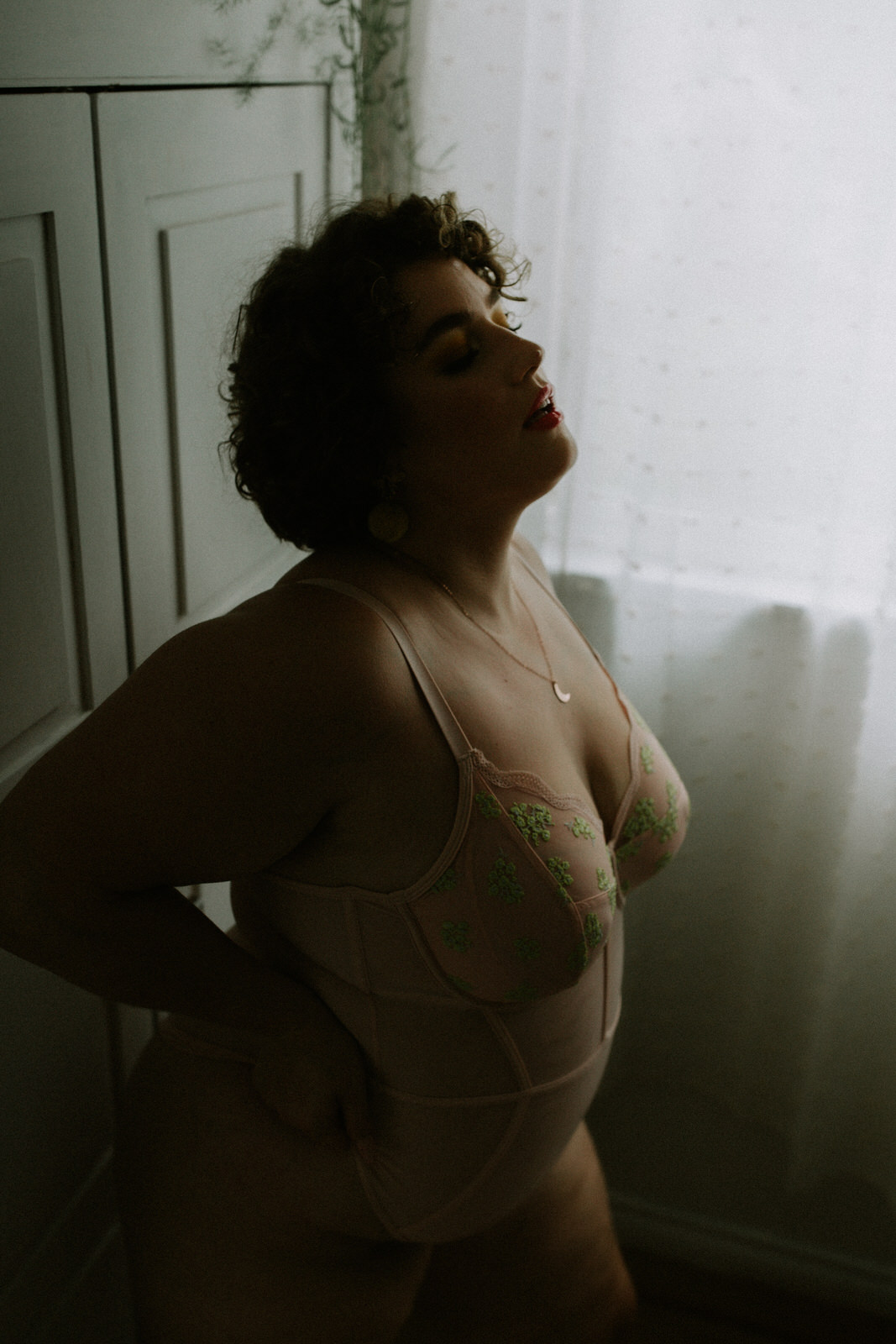Woman in minimalist intimate portrait with soft simple styling