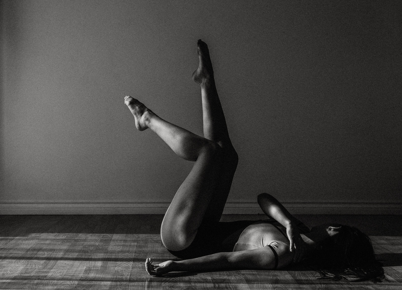 Contemporary dancer in artistic movement portrait with simple styling