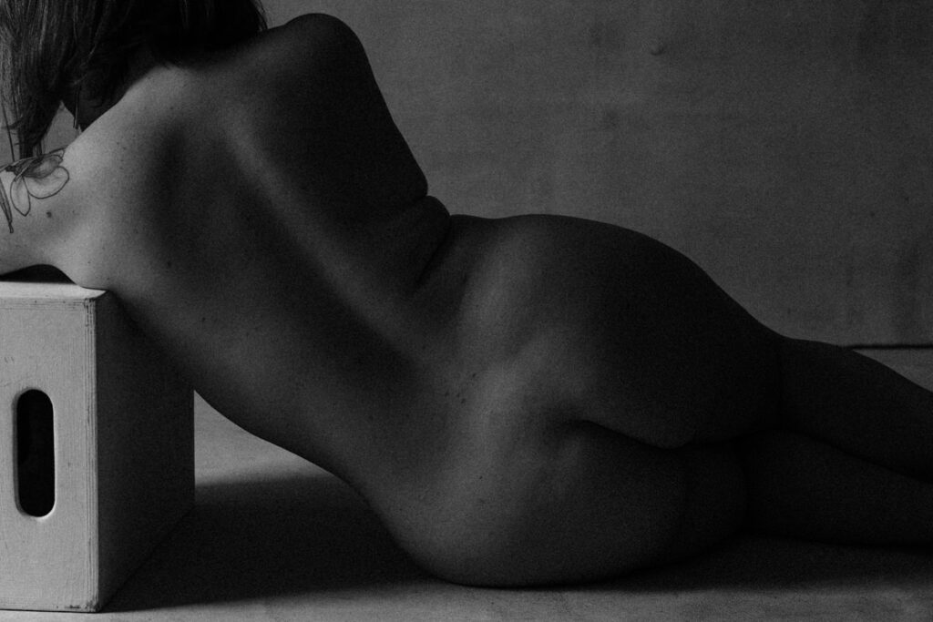 Fine art nude portrait of a woman showing her backside by vancouver portrait photographer michele mateus