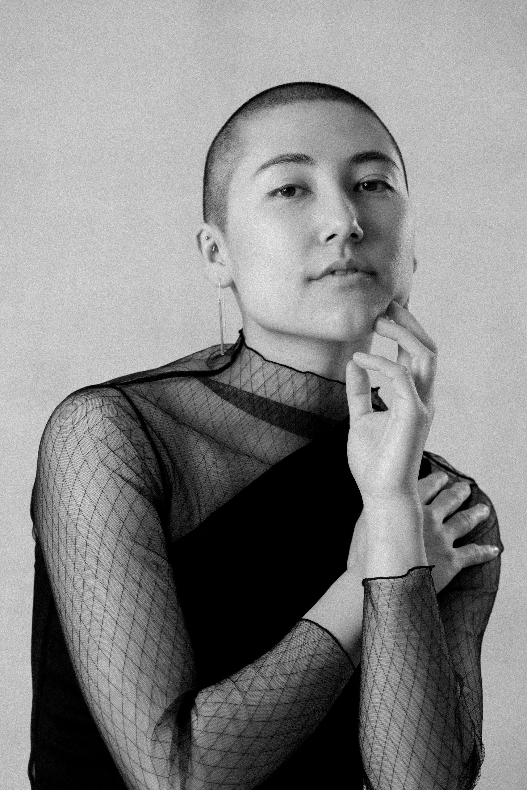 Black and white studio portrait of contemporary dancer Shion Carter photographed by Vancouver portrait photographer Michele Mateus