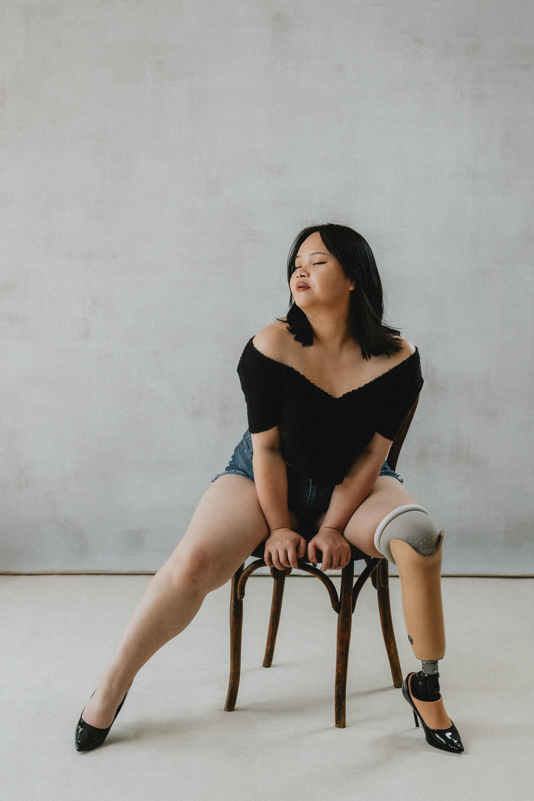 Portrait of a woman with a leg limb difference by Michele Mateus Studios, Vancouver Portrait Photographer