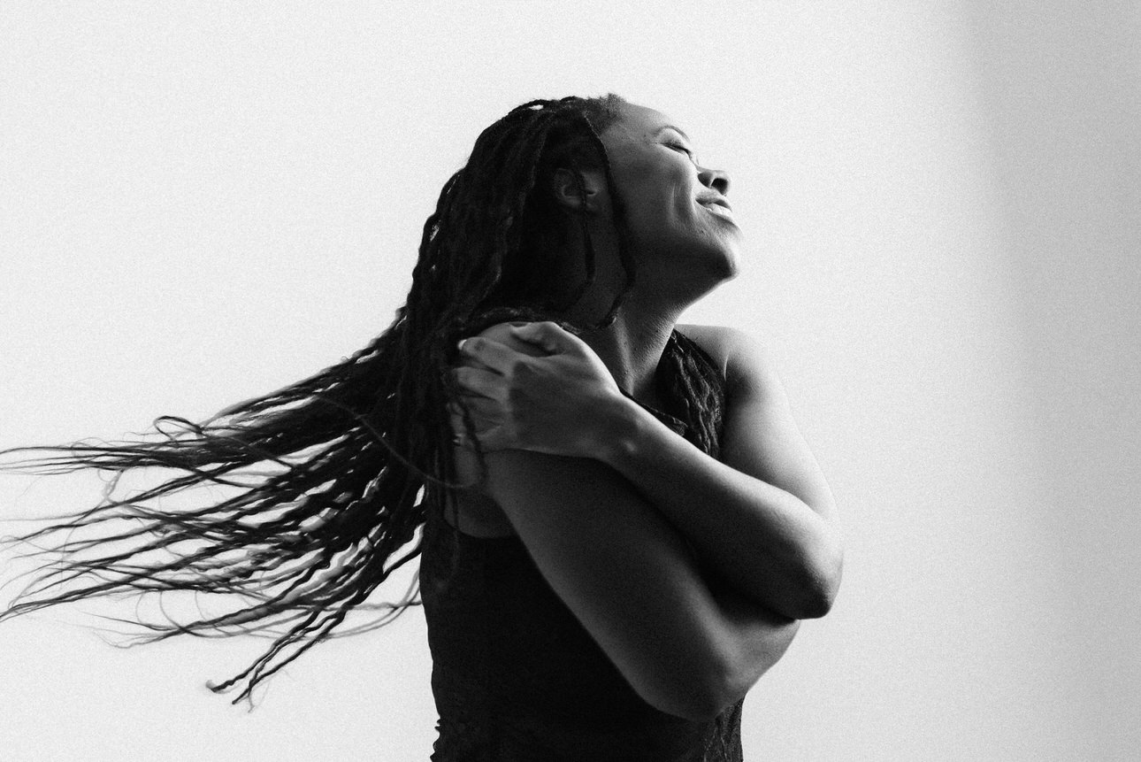 Black and white fine art portrait of a Black Woman by Vancouver portrait photographer Michele Mateus