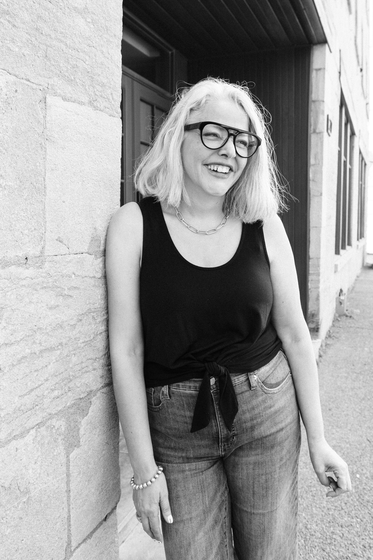 Artistic black-and-white portrait of Vancouver photographer Michele Mateus, shot in Montreal